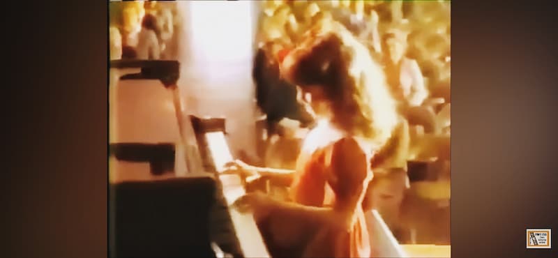 Still from McDonald's commercial featuring a girl playing piano at a recital