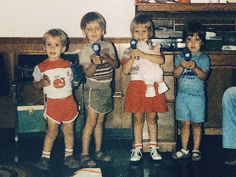 Sarah as a young child with her brother and cousins